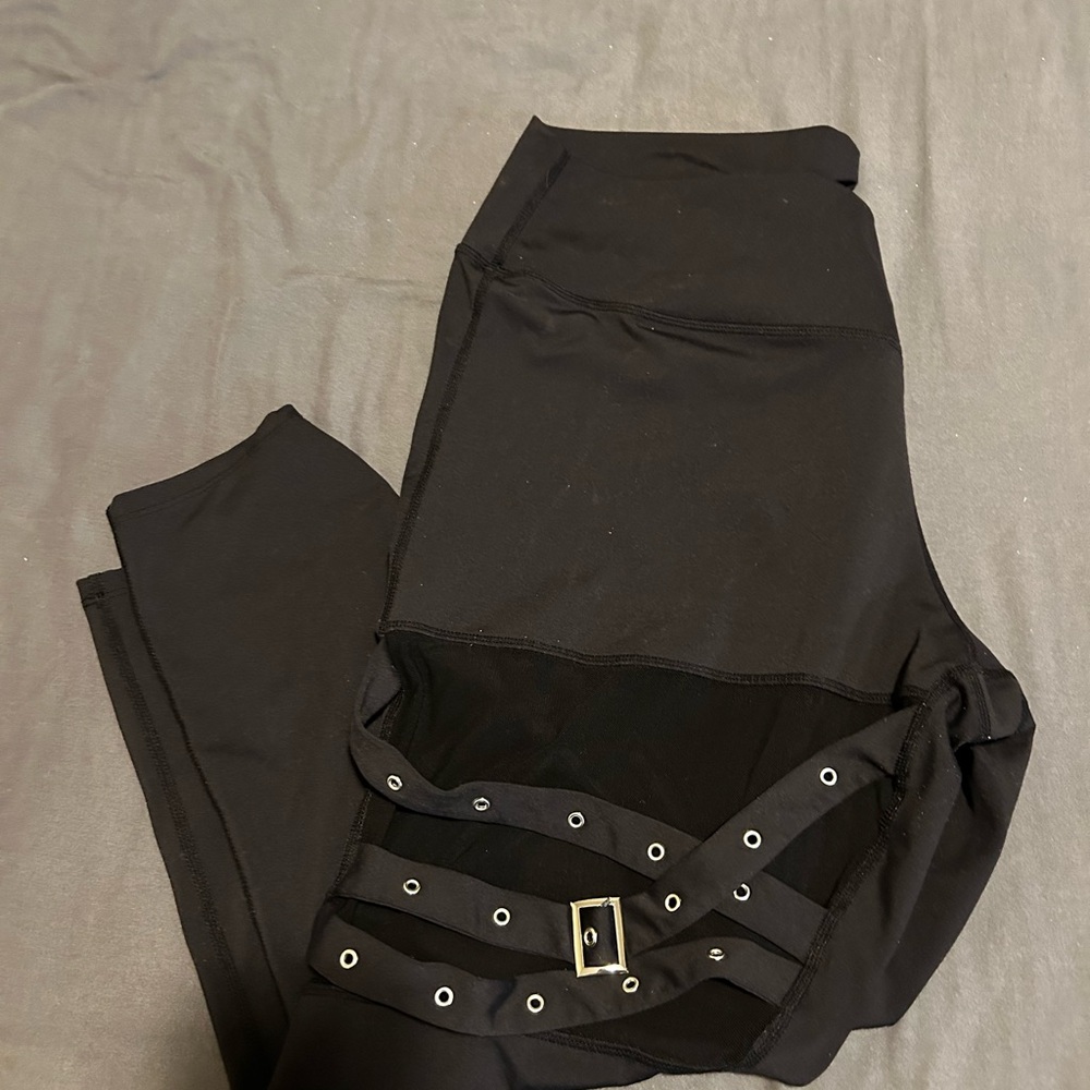 Halara Black Leggings with mesh/strappy detail/buckle